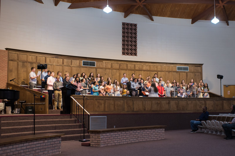 The choir singing at God’s Acres